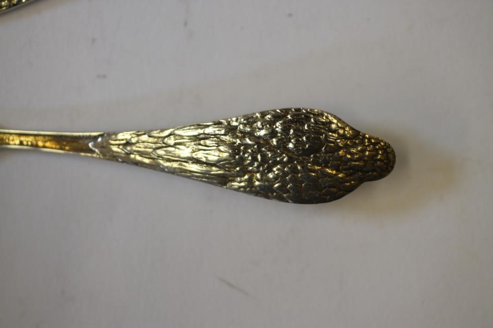 A PAIR OF GILDED SILVER  "BIRTH RECORD" SPOONS Image