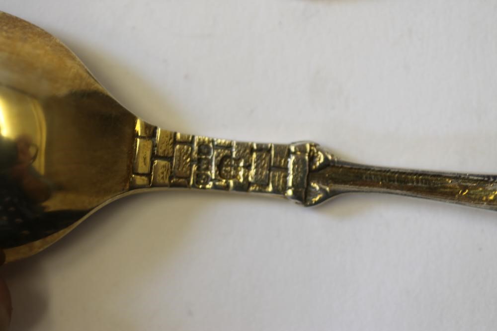 A PAIR OF GILDED SILVER  "BIRTH RECORD" SPOONS Image