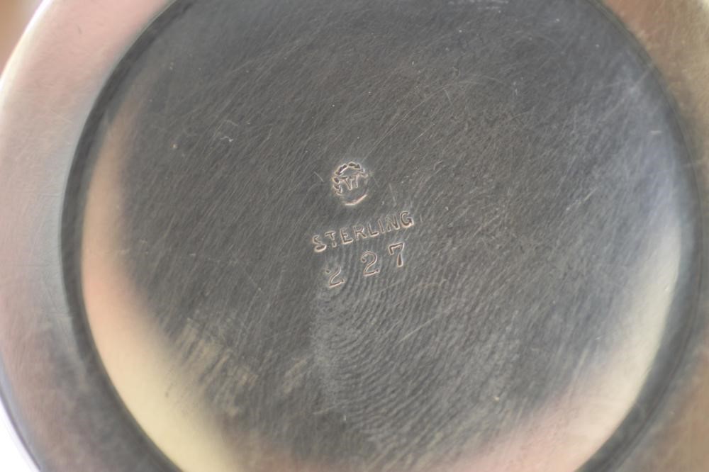 A SILVER TEA CANISTER AND COVER Image