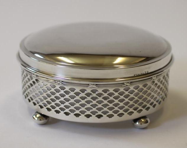 A SILVER BOX AND COVER Image