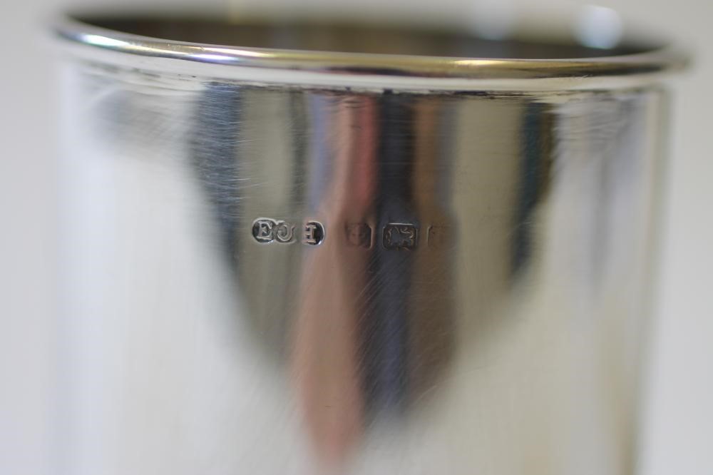 A PAIR OF SILVER SAUCE BOTTLE COASTERS Image