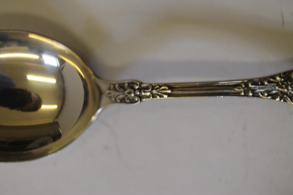 A SET OF SIX SILVER SOUP SPOONS Image