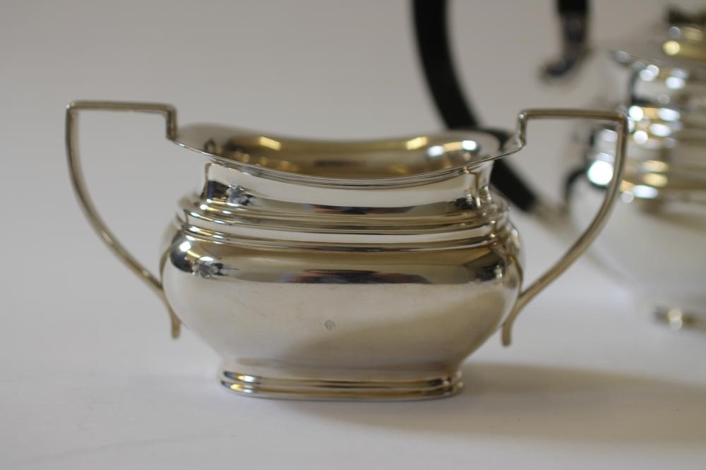 A THREE PIECE SILVER TEA SERVICE Image