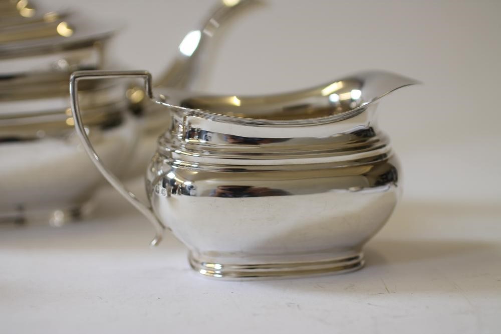 A THREE PIECE SILVER TEA SERVICE Image