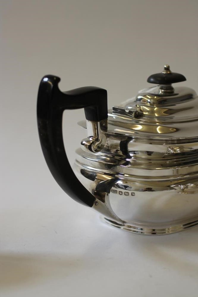 A THREE PIECE SILVER TEA SERVICE Image