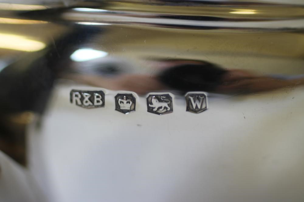 A THREE PIECE SILVER TEA SERVICE Image