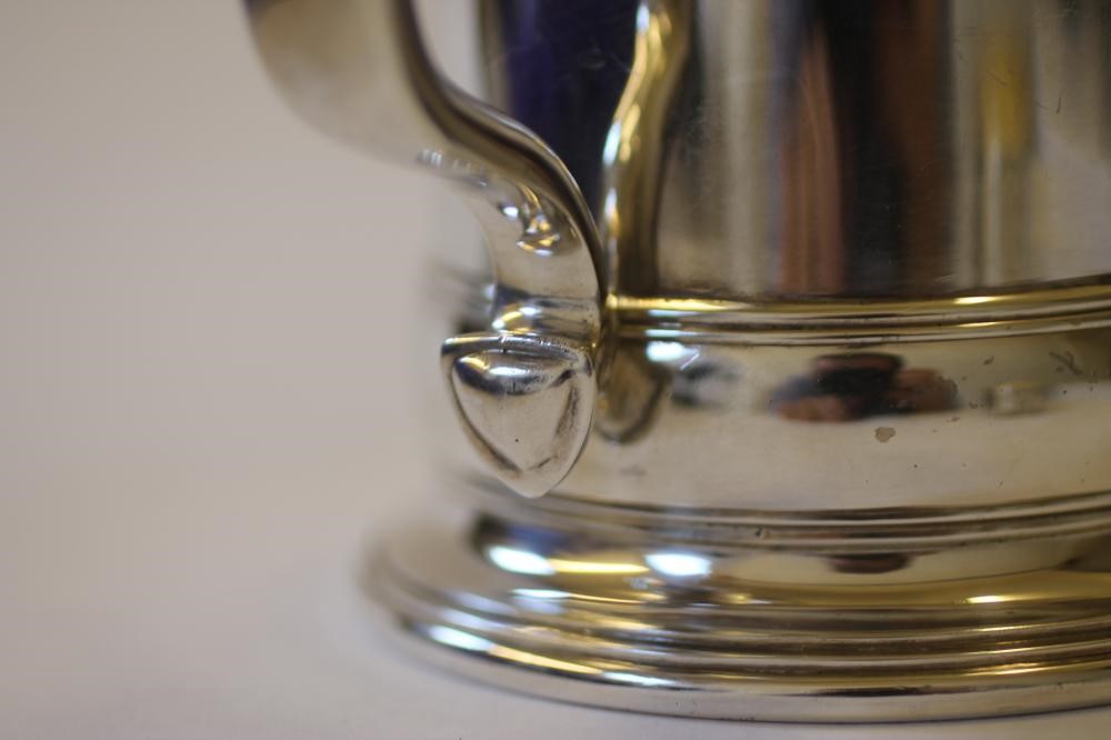 AN ART DECO SILVER MUG Image