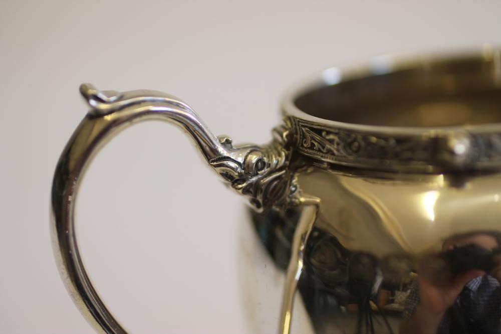 A SILVER TWO PIECE STRAWBERRY SET Image