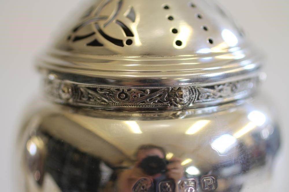 A SILVER TWO PIECE STRAWBERRY SET Image