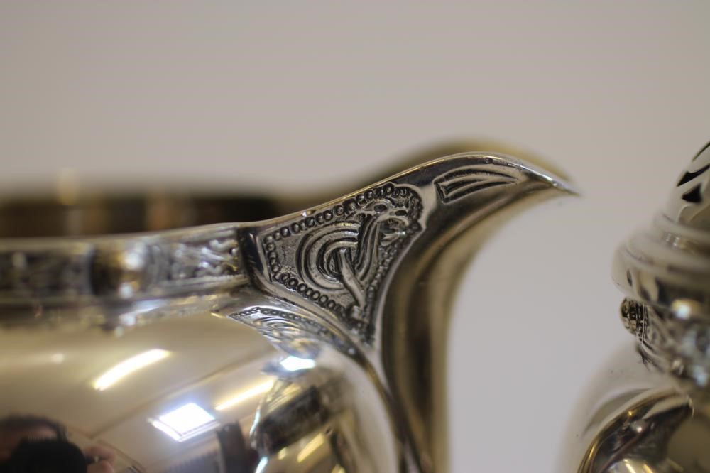 A SILVER TWO PIECE STRAWBERRY SET Image