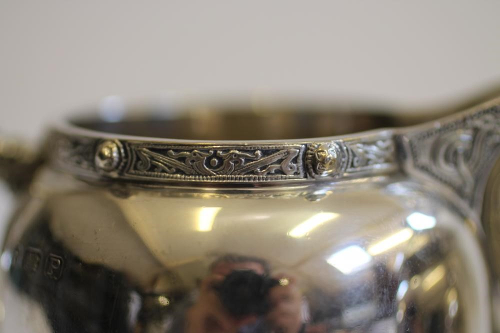 A SILVER TWO PIECE STRAWBERRY SET Image