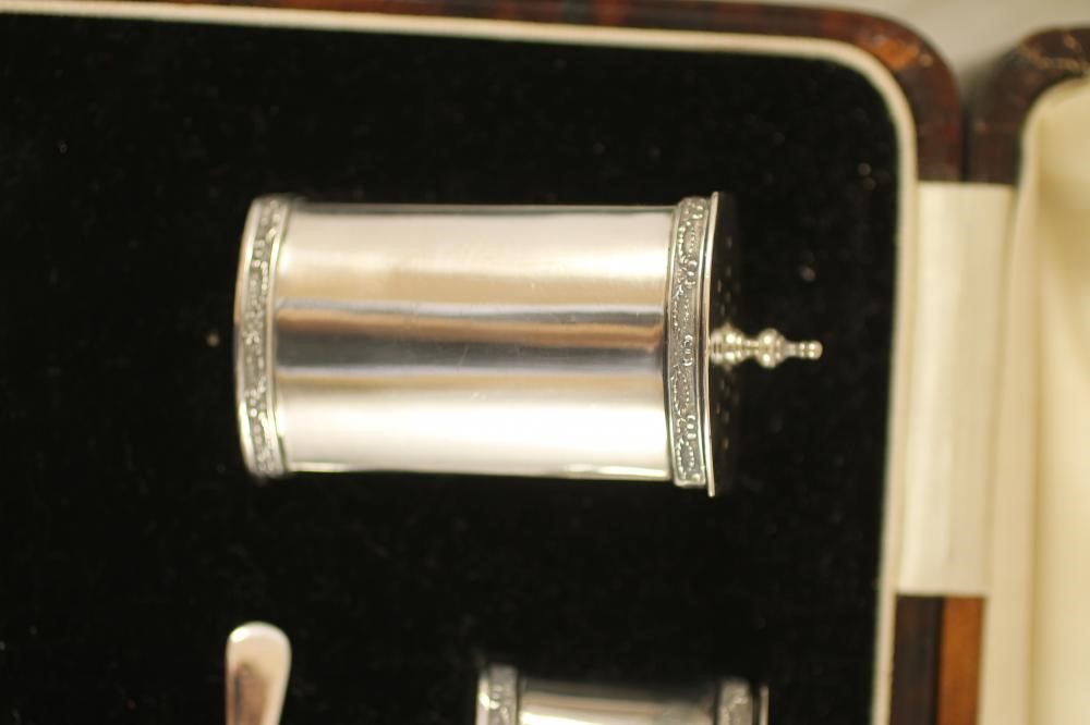 AN ART DECO SILVER FIVE PIECE CRUET Image