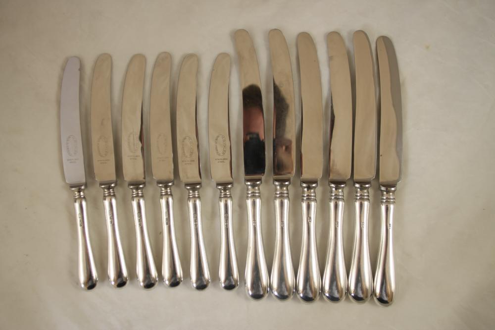 A SET OF SIX EACH TABLE AND DESSERT KNIVES Image