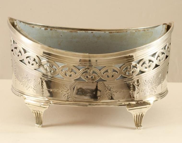 A GEORGE III SILVER CRUET STAND Image