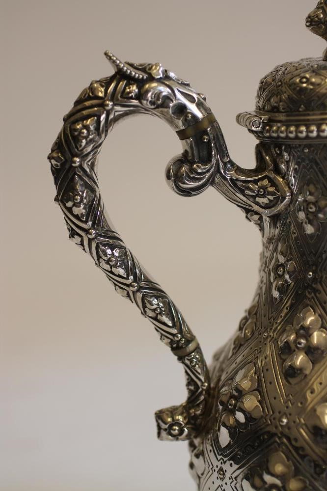 A MID VICTORIAN SILVER WINE JUG Image