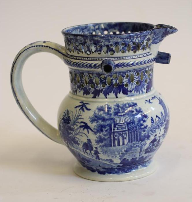 A YORKSHIRE PEARLWARE PUZZLE JUG Image