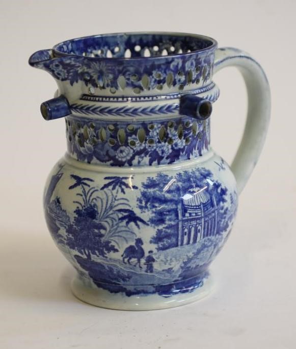 A YORKSHIRE PEARLWARE PUZZLE JUG Image
