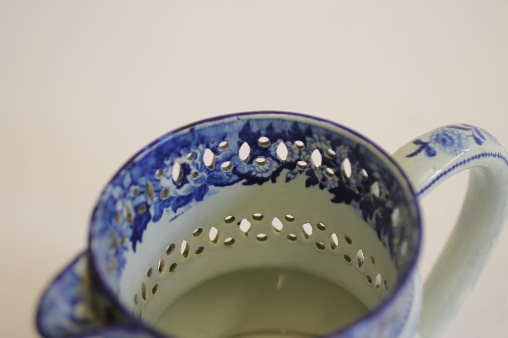 A YORKSHIRE PEARLWARE PUZZLE JUG Image