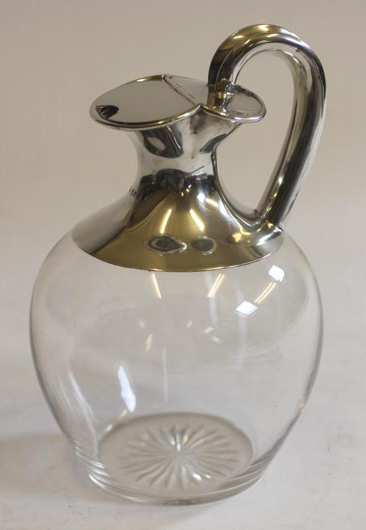A LATE VICTORIAN WINE JUG Image