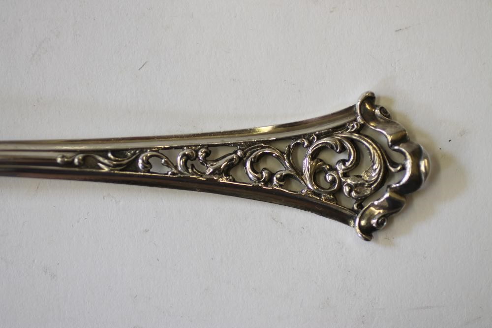 A PAIR OF LATE VICTORIAN SILVER SALAD SERVERS Image