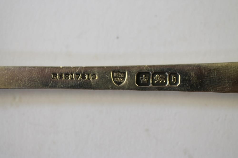 A PAIR OF LATE VICTORIAN SILVER SALAD SERVERS Image