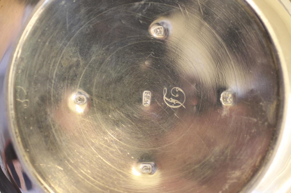 A COMPOSITE MID VICTORIAN SILVER THREE PIECE TEA SERVICE Image