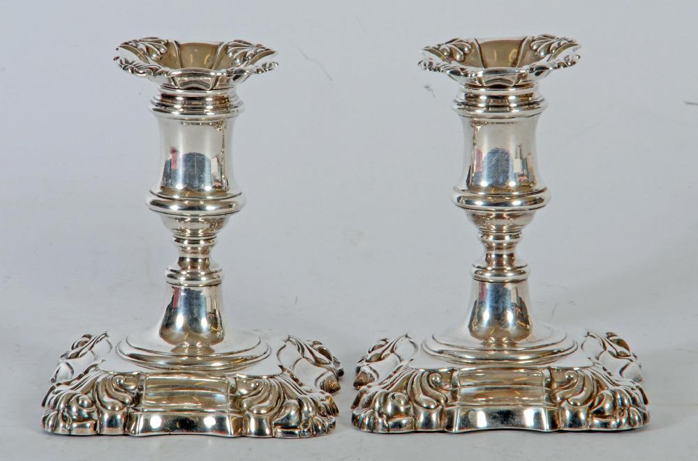 A PAIR OF EARLY VICTORIAN SILVER DWARF CANDLESTICKS Image