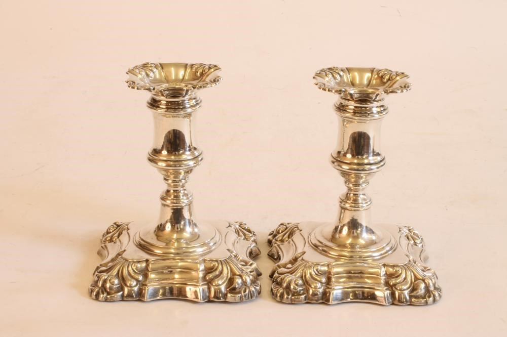 A PAIR OF EARLY VICTORIAN SILVER DWARF CANDLESTICKS Image