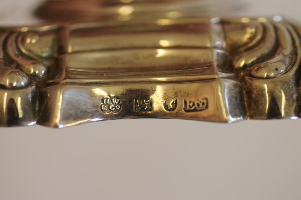 A PAIR OF EARLY VICTORIAN SILVER DWARF CANDLESTICKS Image