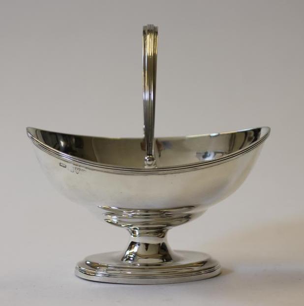 AN EDWARDIAN SILVER SUGAR BASKET Image