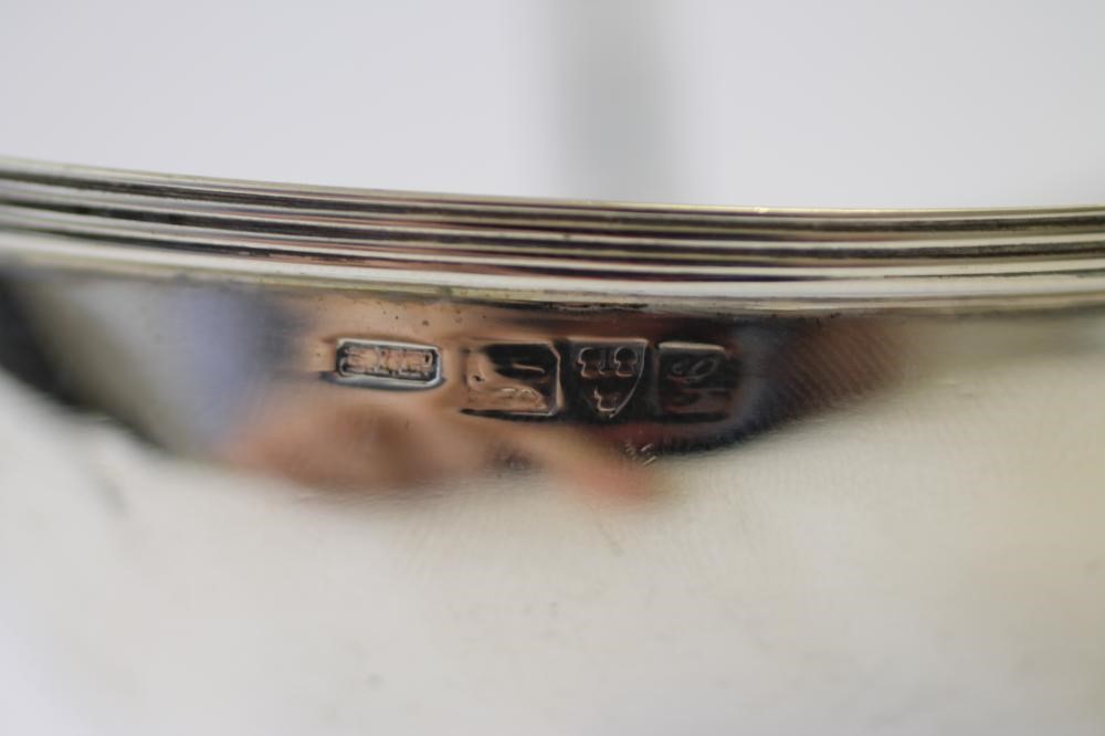 AN EDWARDIAN SILVER SUGAR BASKET Image