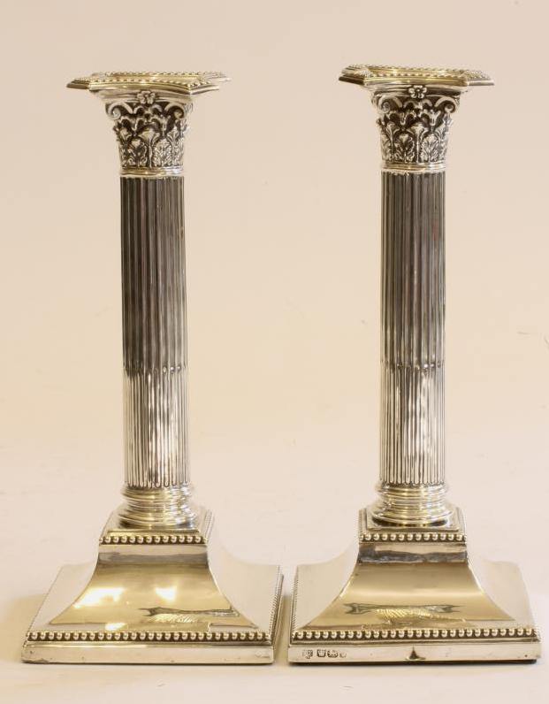 A PAIR OF EDWARDIAN SILVER CANDLESTICKS Image