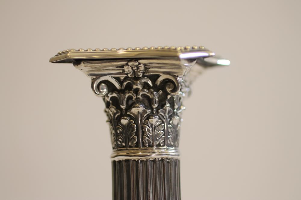 A PAIR OF EDWARDIAN SILVER CANDLESTICKS Image