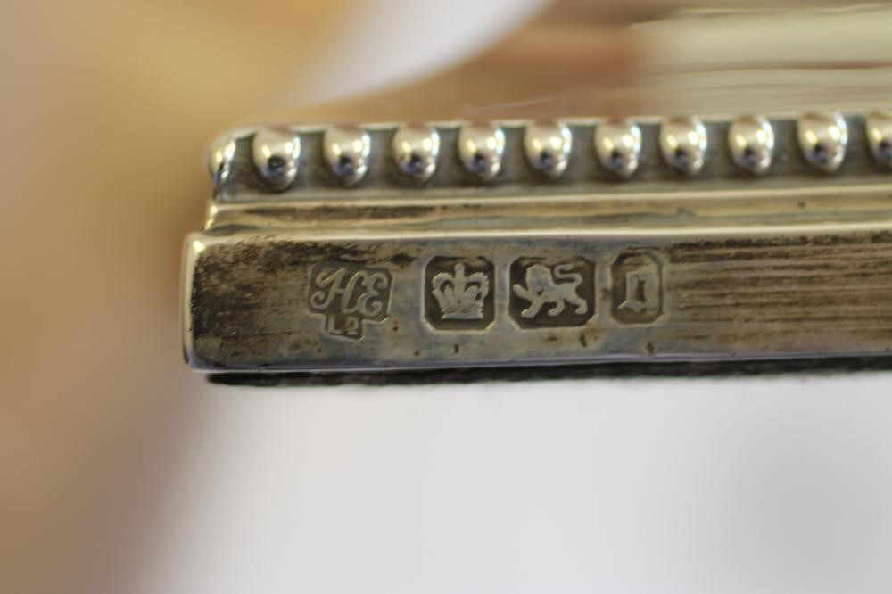 A PAIR OF EDWARDIAN SILVER CANDLESTICKS Image