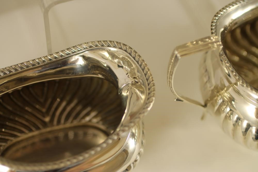 A COMPOSITE THREE PIECE SILVER TEA SERVICE Image
