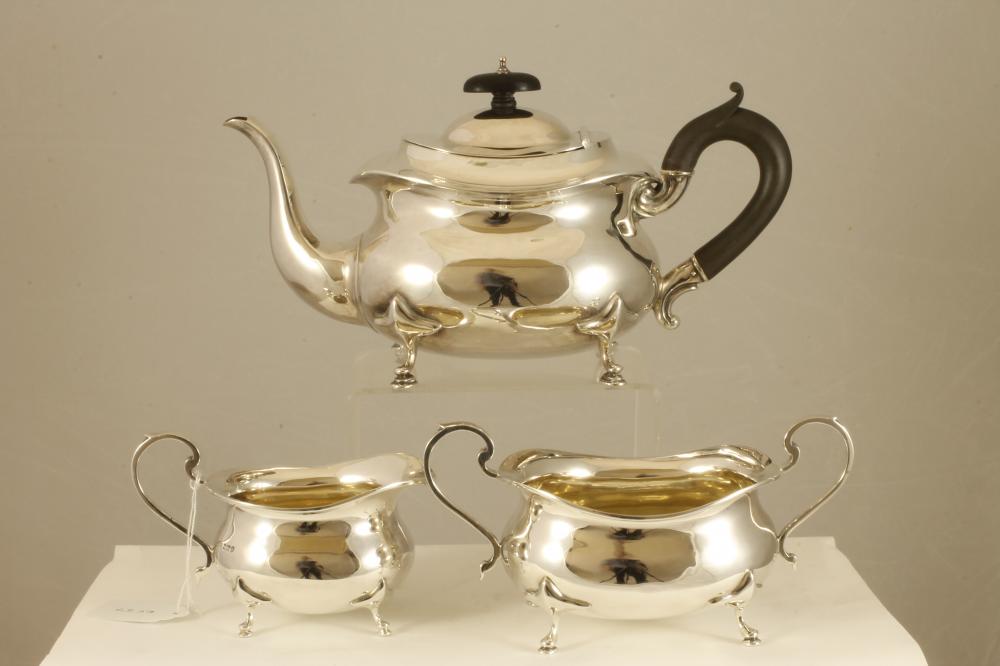 AN EDWARDIAN SILVER THREE PIECE TEA SERVICE Image
