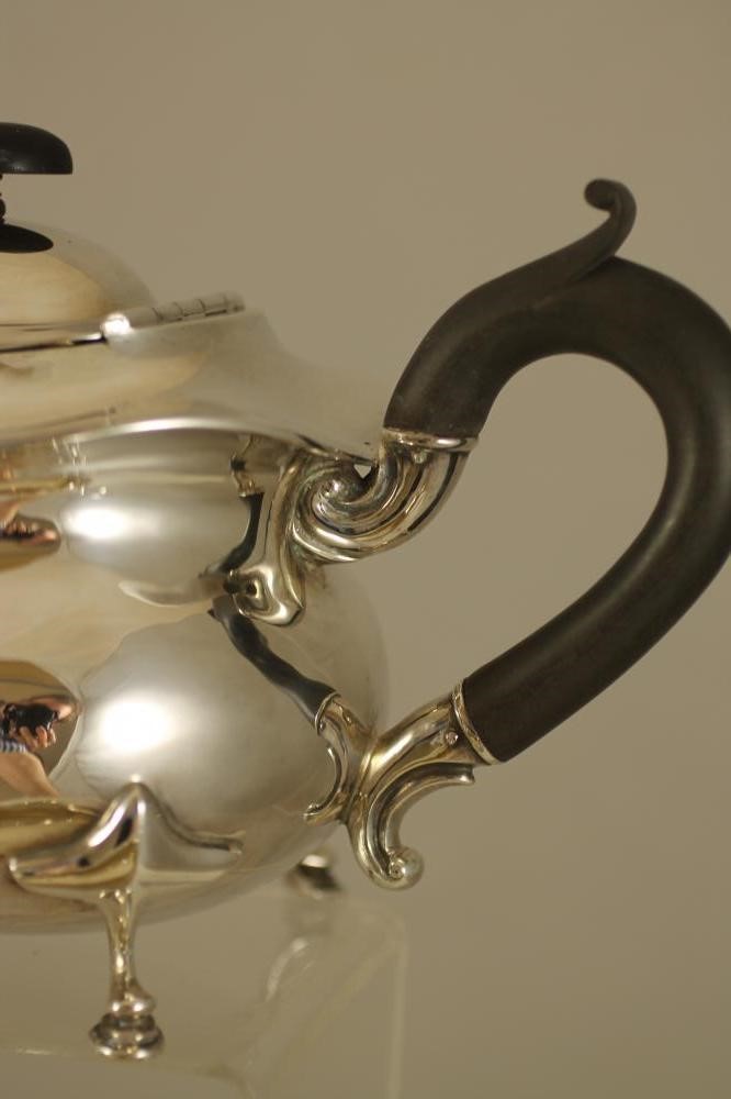AN EDWARDIAN SILVER THREE PIECE TEA SERVICE Image