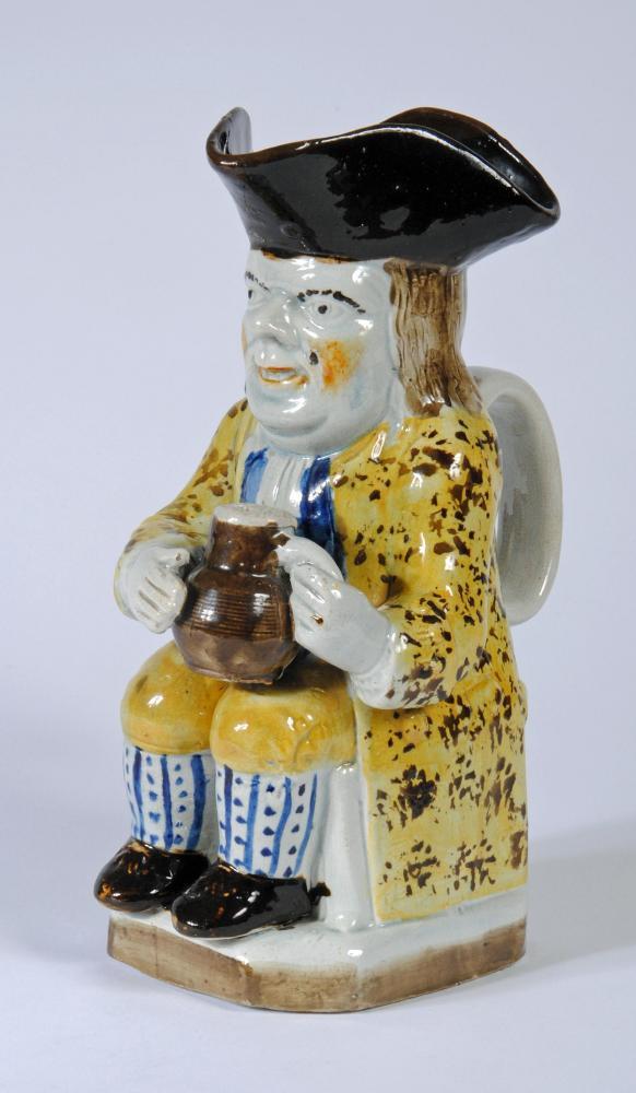 A PEARLWARE TOBY JUG Image