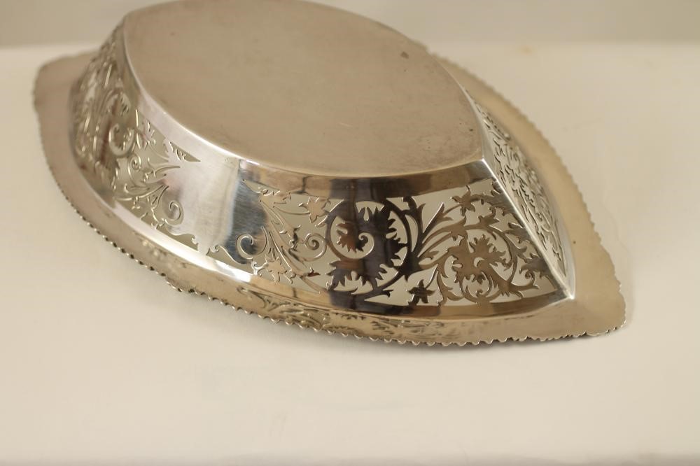 A LATE VICTORIAN SILVER BASKET Image