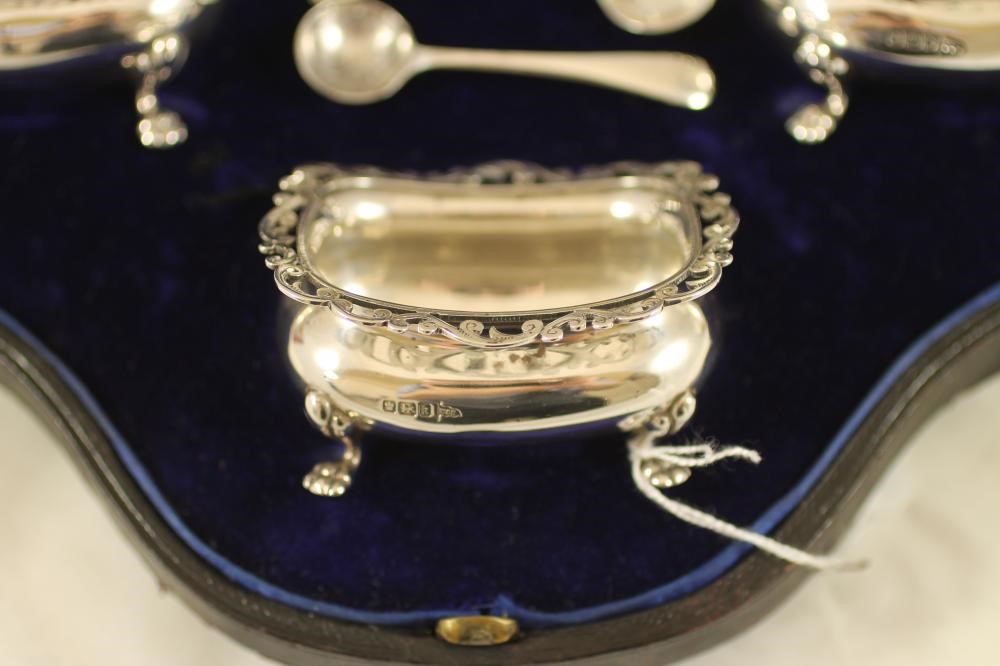 A SET OF FOUR EDWARDIAN SILVER SALTS Image
