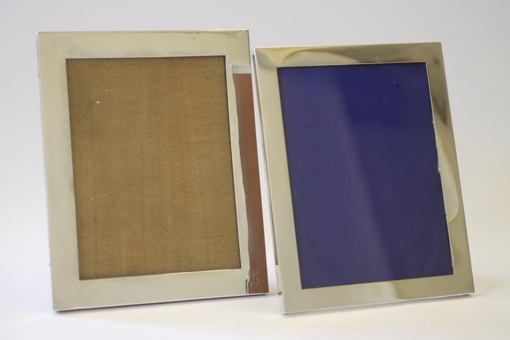 TWO SIMILAR EASEL BACK SILVER PHOTOGRAPH FRAMES Image