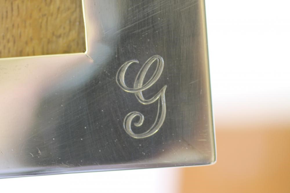 TWO SIMILAR EASEL BACK SILVER PHOTOGRAPH FRAMES Image