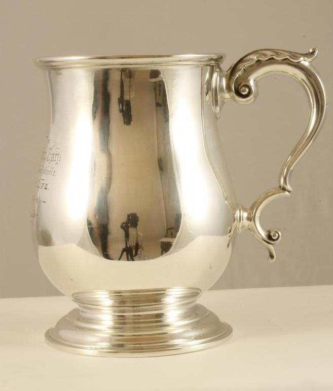 A LATE VICTORIAN SILVER MUG Image