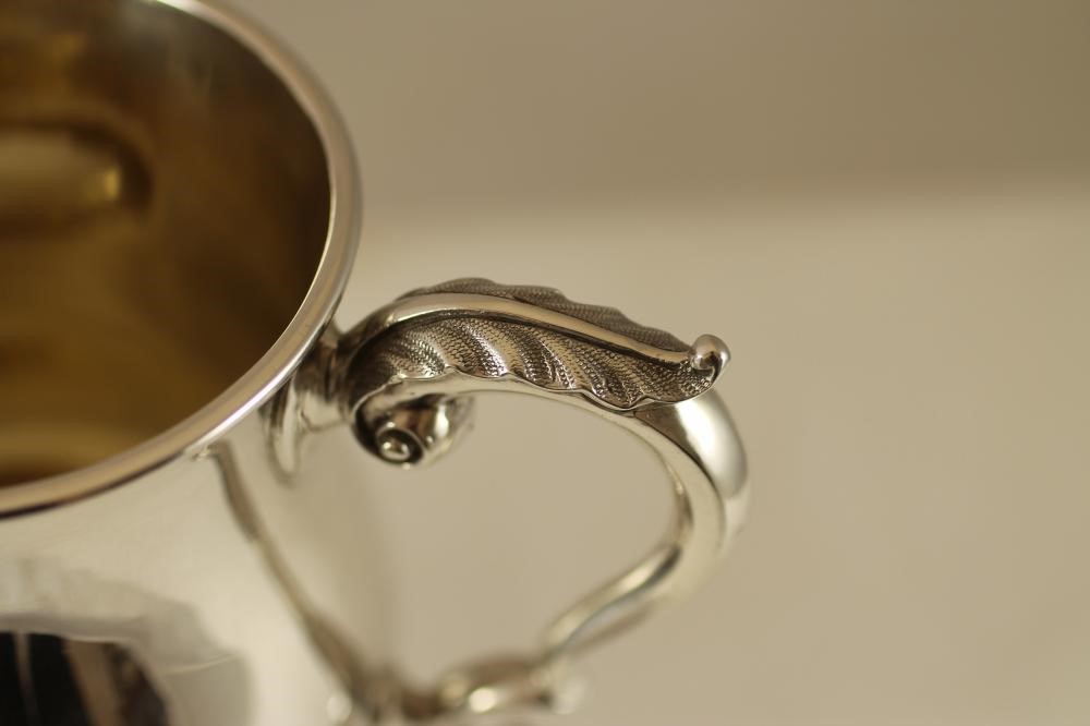 A LATE VICTORIAN SILVER MUG Image