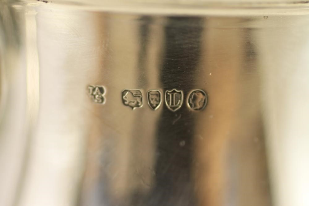 A LATE VICTORIAN SILVER MUG Image