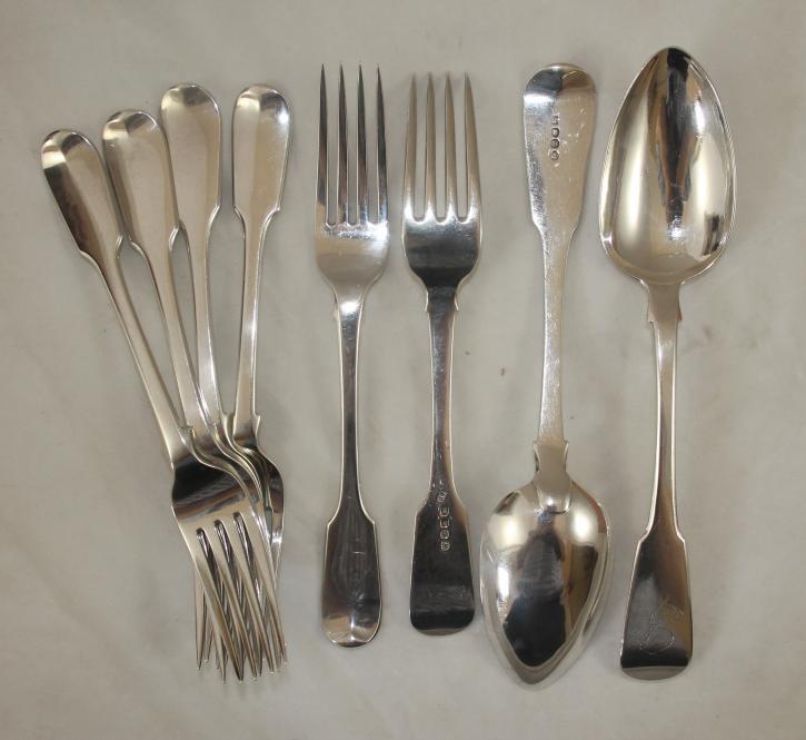 A SET OF FOUR LATE GEORGE III SILVER TABLE FORKS Image