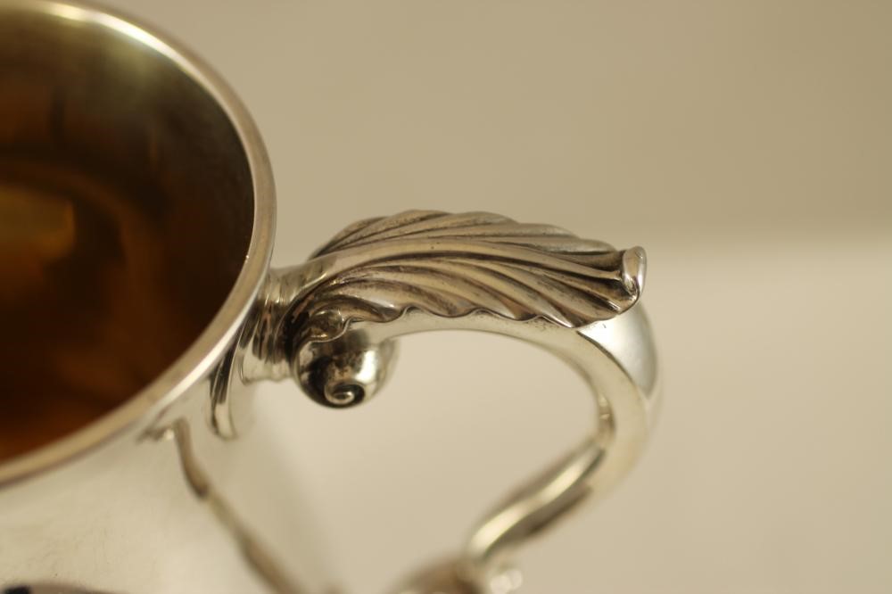 A GEORGE III SILVER MUG Image