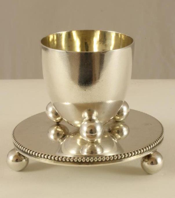 A LATE VICTORIAN SILVER EGG CUP Image