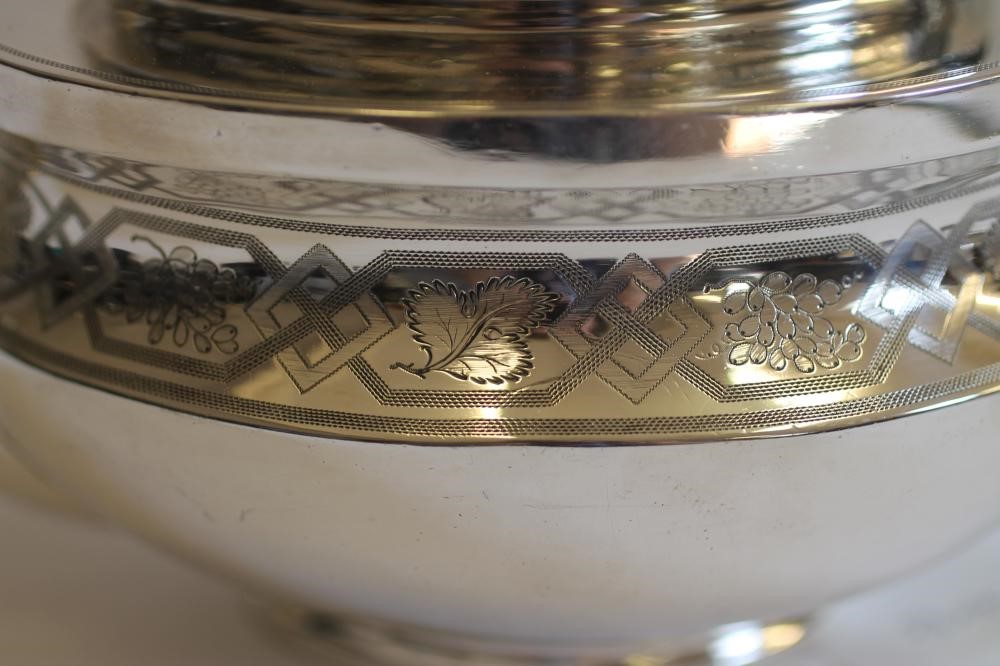 A GEORGE III SILVER TEAPOT Image