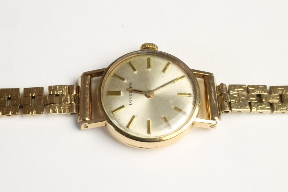 A LADY'S 9CT GOLD LONGINES WRISTWATCH Image